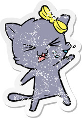 distressed sticker of a cartoon cat