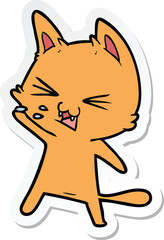 sticker of a cartoon cat hissing