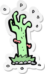 sticker of a cartoon zombie rising from grave
