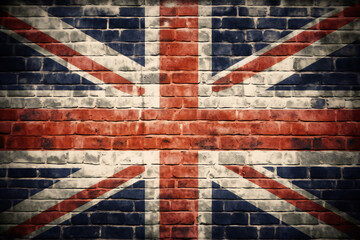 British Union flag on a brick wall with grunge old brick texture. national flag of great britain - obrazy, fototapety, plakaty