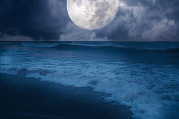 Harvest moon over the ocean