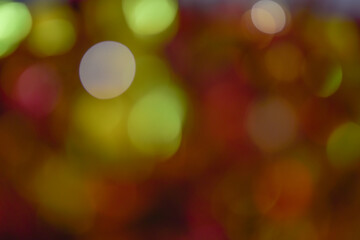 
Christmas bokeh with retro ornaments and gold glitter in blurry background.