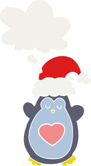 cute christmas penguin with thought bubble in retro style