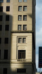 The city view with the old buildings and architectures under the warm sunlight
