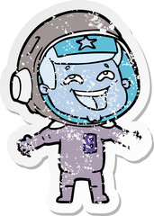 distressed sticker of a cartoon laughing astronaut
