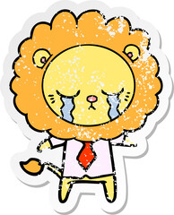 distressed sticker of a crying cartoon lion