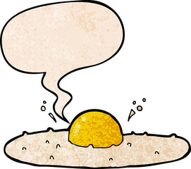 cartoon fried egg with speech bubble in retro texture style