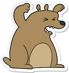 sticker of a cartoon roaring bear