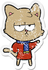 distressed sticker of a bored cartoon cat in winter clothes