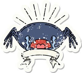 worn old sticker of a tattoo style crying spider