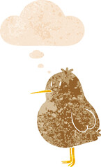 cartoon kiwi bird with thought bubble in grunge distressed retro textured style