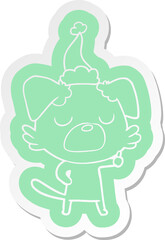 quirky cartoon  sticker of a dog wearing santa hat