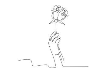 A hand holding a rose. Spring one-line drawing