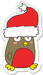 sticker of a cartoon christmas robin wearing santa hat