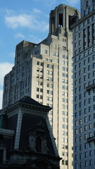 The city view with the old buildings and architectures under the warm sunlight