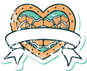 iconic distressed sticker tattoo style image of a heart and banner with flowers