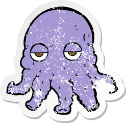 retro distressed sticker of a cartoon alien squid face