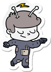 sticker of a friendly cartoon spaceman pointing