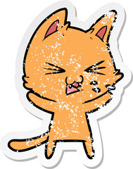 distressed sticker of a cartoon cat hissing