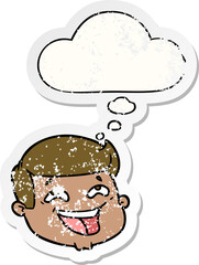 happy cartoon male face with thought bubble as a distressed worn sticker