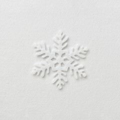 Christmas decoration in the shape of a snowflake on a white background