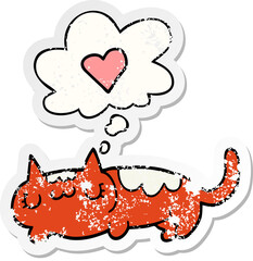 cartoon cat with thought bubble as a distressed worn sticker