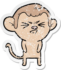 distressed sticker of a cartoon annoyed monkey