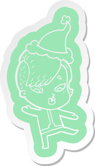 quirky cartoon  sticker of a surprised girl in science fiction clothes wearing santa hat