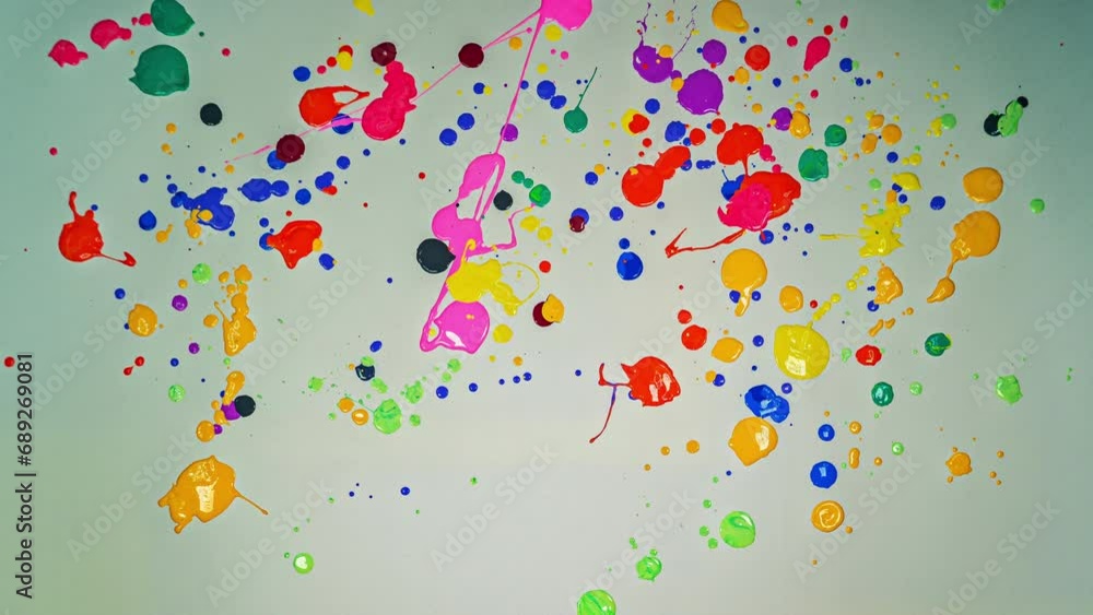 Poster .motionlapse various colors splashed onto a white background..abstract image of various colors dripp