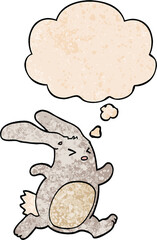 cartoon rabbit with thought bubble in grunge texture style