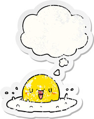cartoon fried egg with thought bubble as a distressed worn sticker