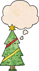 cartoon christmas tree with thought bubble in grunge texture style