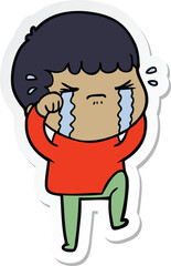 sticker of a cartoon man crying