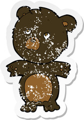 retro distressed sticker of a cartoon funny teddy bear