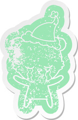 crying quirky cartoon distressed sticker of a polarbear wearing santa hat
