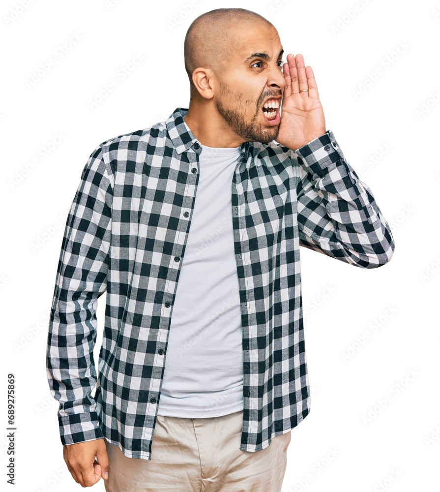 Poster Hispanic adult man wearing casual clothes shouting and screaming loud to side with hand on mouth. communication concept.