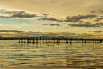 Obraz premium Sunset overlooking fishing nets in Lake Albufera