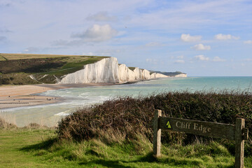 A warning sign Cliff Edge on the south coast of Britain. The Seven Sisters.