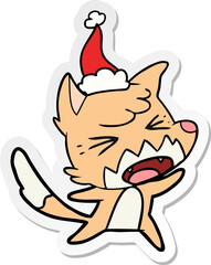 angry hand drawn sticker cartoon of a fox wearing santa hat
