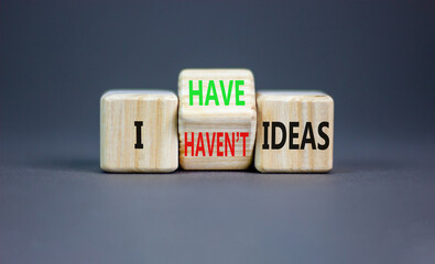 I have or not idea symbol. Concept word I have or have not ideas on beautiful wooden cubes. Beautiful grey table grey background. Business and i have or not idea concept. Copy space.