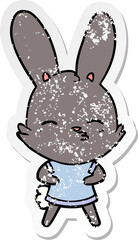 distressed sticker of a curious bunny cartoon