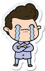 sticker of a cartoon man crying