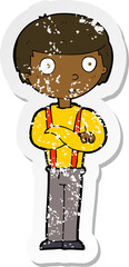 retro distressed sticker of a cartoon staring boy