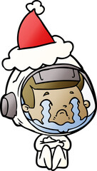 hand drawn gradient cartoon of a crying astronaut wearing santa hat