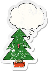 cartoon christmas tree with thought bubble as a distressed worn sticker