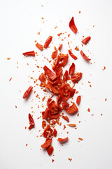 Flat lay with pieces of paprika on a white background.Minimal concept.