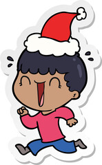 laughing hand drawn sticker cartoon of a man wearing santa hat
