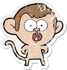 distressed sticker of a cartoon shocked monkey