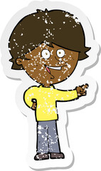 retro distressed sticker of a cartoon boy laughing and pointing