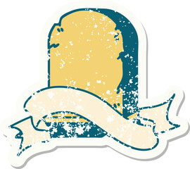 worn old sticker with banner of a grave stone
